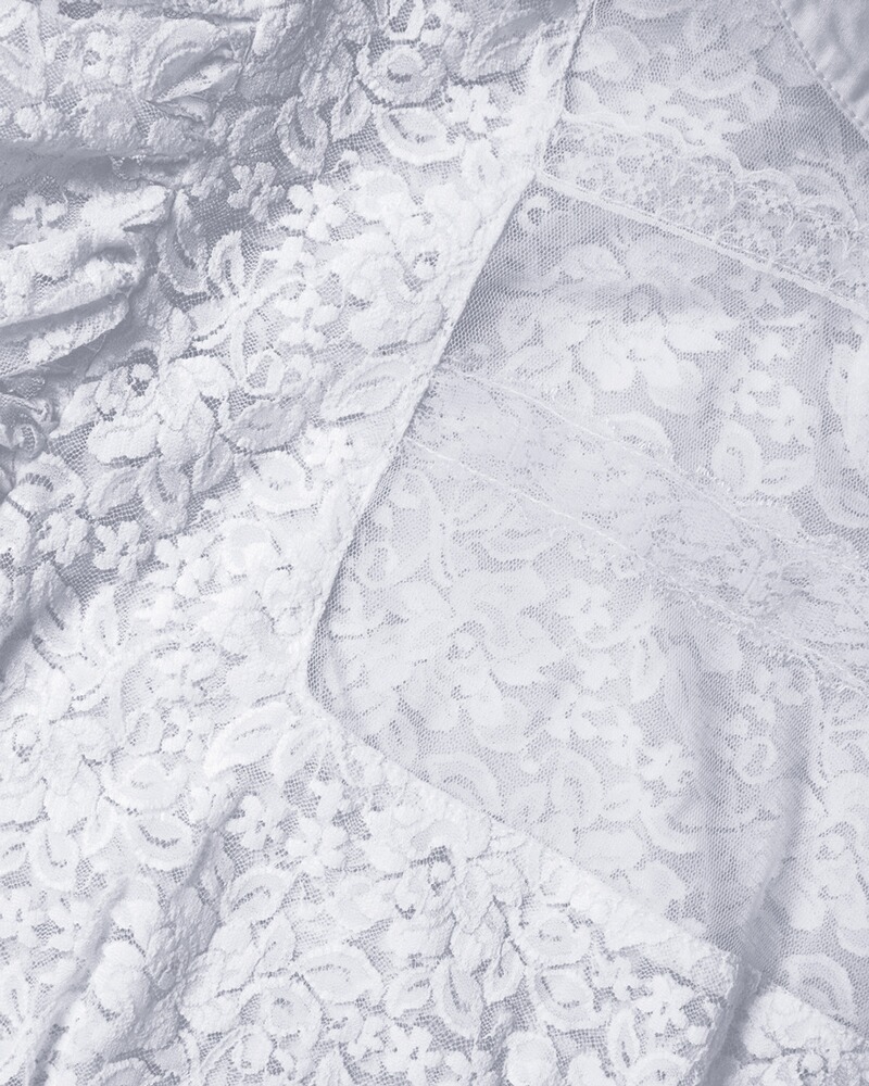 Dirndlbluse aus Spitze , Almsach